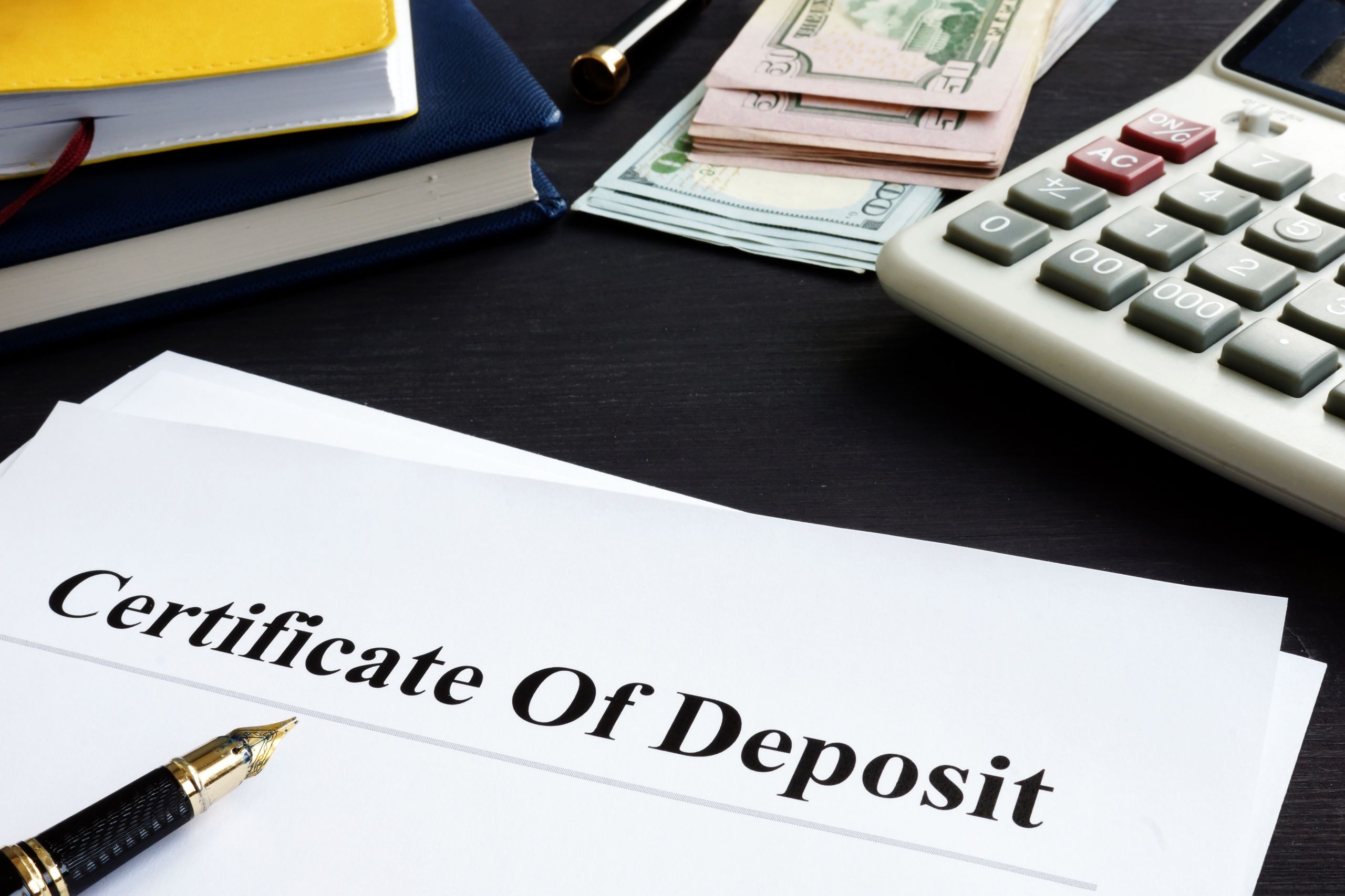 There are many pros and cons of investing in a Certificate of Deposit through a bank or credit union for small investments.